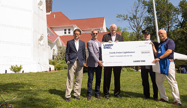 Left to Right: Jeff Gales (USLS Executive Director), Jerome Griffith (Lands' End CEO), Tom Barrett (Milwaukee Mayor), Mark Kuehn (North Point Lighthouse Curator), and John Scripp (North Point Lighthouse President)
